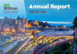 The front cover of the 2023/24 Annual Report which shows a picture of Edinburgh Waverley train station at dusk, with a blue sky and lights on platform, trains and distant buildings and vehicles. The SEStran logo is in the top left corner and the words 'Annual Report 2023 - 24' and top right.