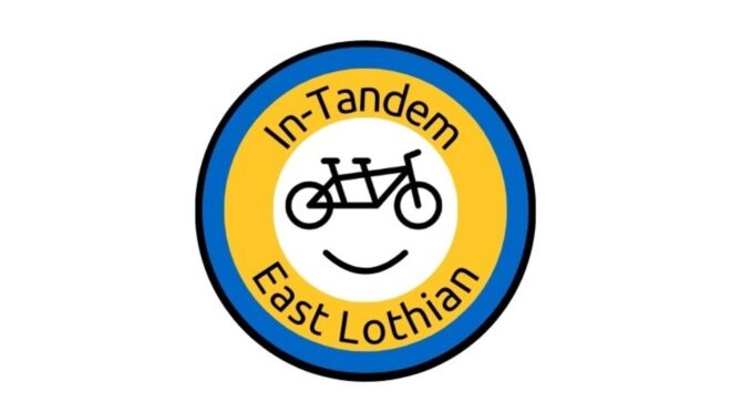 East Lothian Just Transition Bike Libraries logo featuring a yellow circle with a simple bicycle illustration, surrounded by blue text and enclosed within a blue outer ring.